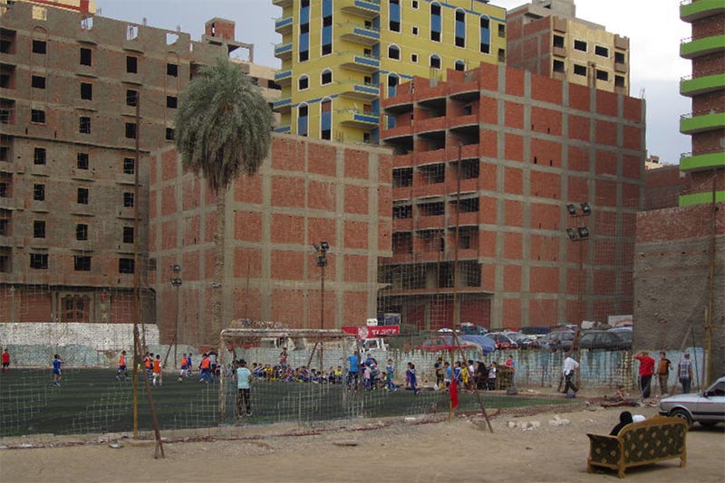 Zwischen Duldung und Illegalität - Vom Wohnen in den informellen Siedlungen Kairos